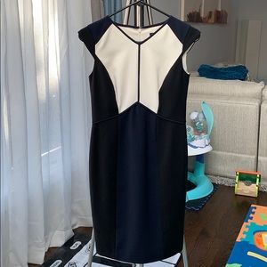 Dress wear to work. Length right below knees.